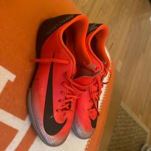 Nike Mercurial flats.  Slightly used